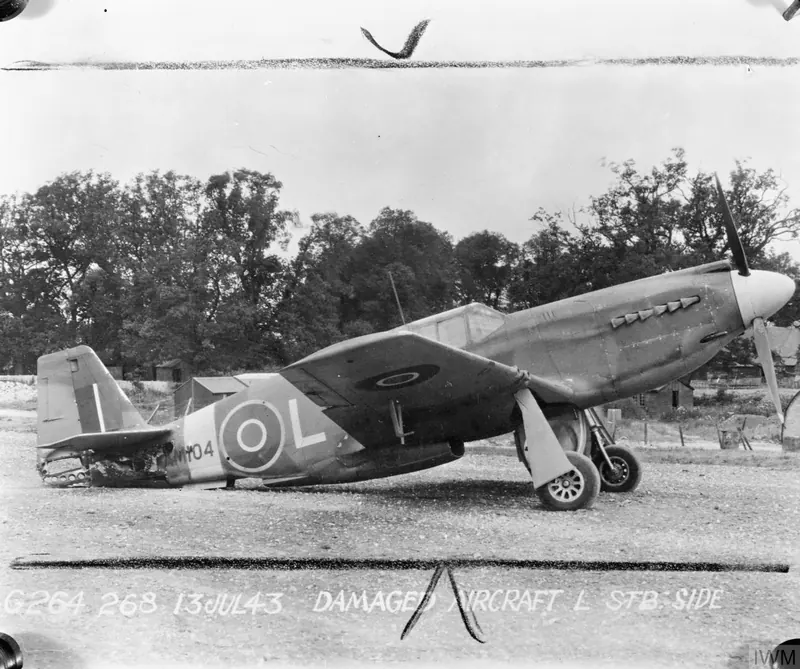 A badly damaged RAF Mustang fighter on the ground at RAF Odiham in 1943